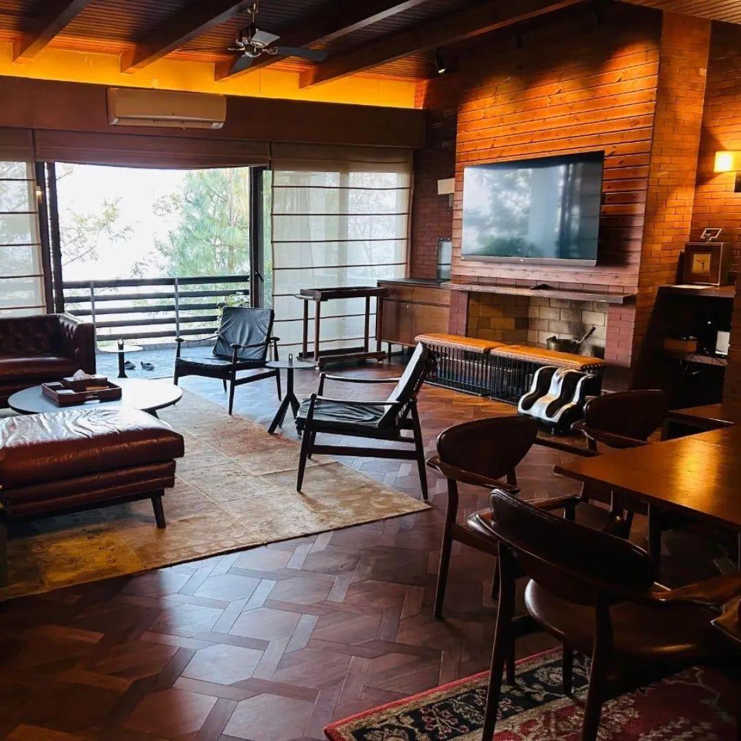 Wood-Panelled Living Room with Parquet, Kanpur